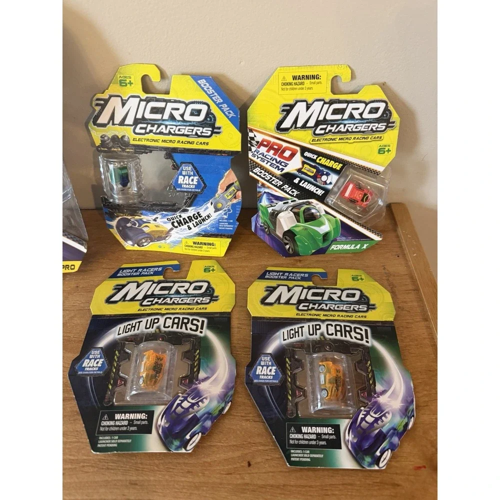 MICRO CHARGERS PRO RACING SYSTEM LAUNCHER PACK with 8 Micro Racing Cars
